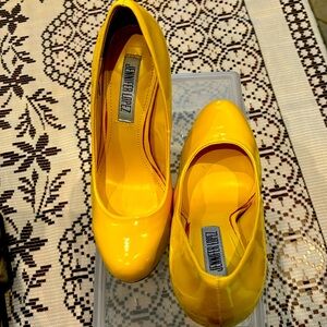 J Lo, yellow cork shoes